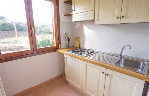 Baia Sant'Anna Apartment | Residence Baia Sant'Anna with swimming pool and two bathrooms BudoniRentals