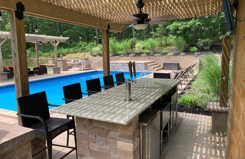 Hampton Bays House | Resort like Backyard-Pool, Putting green, Outside Kitchen, Fire Pit, Bar, Lounge
