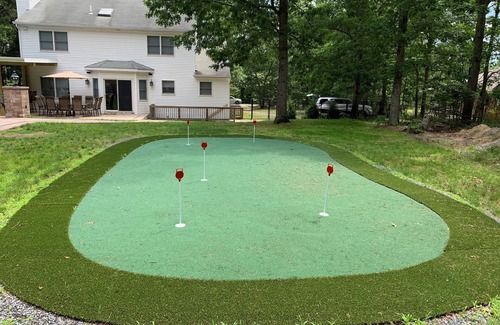 Hampton Bays House | Resort like Backyard-Pool, Putting green, Outside Kitchen, Fire Pit, Bar, Lounge