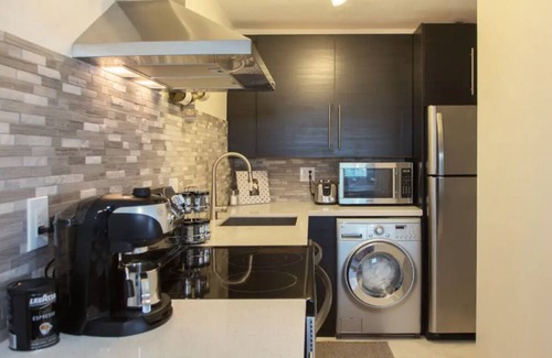 St. Petersburg Condo | Resort style living in a modern condo directly on the waterfront, sunset views