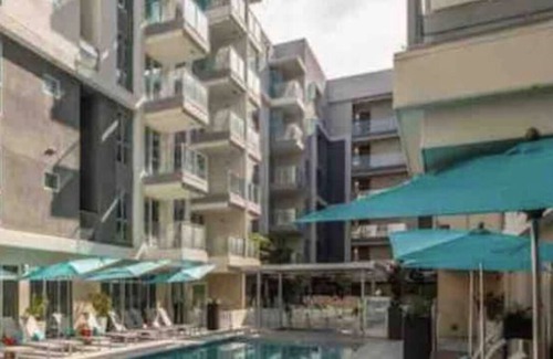 Downtown Apartment | Resort style living next to malls and shopping areas
