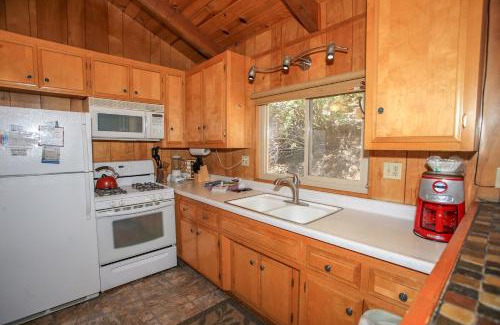 Upper Moonridge House | Rest N Relax Inn - Beautiful chalet-style cabin features dramatic forest and slope views!