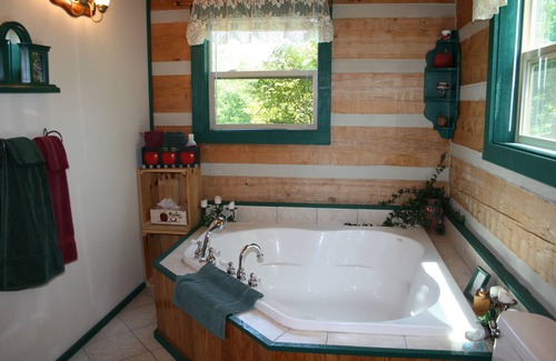 White Cottage Cabin | Rest & relax in a fully furnished cabin on a working orchard and vineyard.