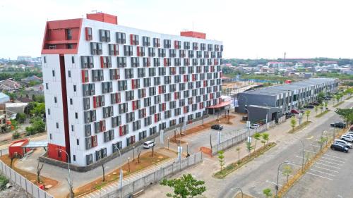 Makassar Apartment | Restful Studio (No Kitchen) Bandaraya - Tallasa City Makassar Apartment By Travelio