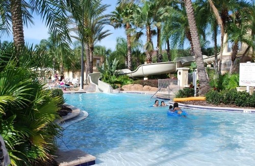 Regal Palms House | Retreat: Lovely 4 Br Sleeps 8 Minutes To Disney 4 Bedroom Townhouse
