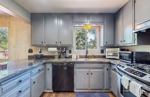 Blue Jay House | Retreat with gas grill, large deck, wood fireplace, lake access & AC