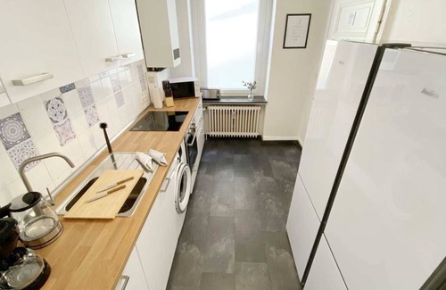 Rheine Apartment | Rh01 - Geräumige Ferienwohnung mit Terrasse und Garten in Rheine, 110 qm, 1 Wohnzimmer, 4 Schlafzimmer, Max. 8 Personen