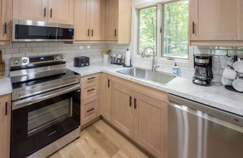 Iron River Cabin | Rider’s Getaway Direct Trail Access +Lakeside Stay