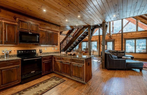 Topton Cabin | River Lodge-Pet Friendly, Luxury Log Cabin Rental, 3 Bedrooms, 5 Fireplaces, Hot Tub, 2 Decks with Outdoor Entertaining Areas on Creek in Western NC