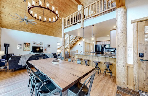San Juan River Village House | Riverfront home with amazing mountain view, private hot tub, deck & fireplace