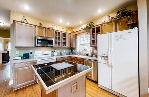 Sylva House | Riverfront home w/fireplace, porch, outdoor firepit, grill and picnic table