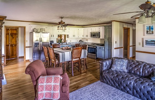 Elizabethton House | Riverfront home with dock, mountain view, grill, firepit, smart TVs