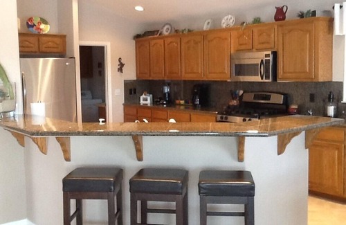 Needles House | Riverfront Home with Beach and Large Front Patio