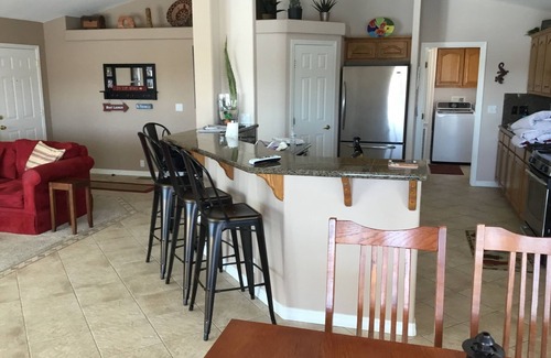 Needles House | Riverfront Home with Beach and Large Front Patio