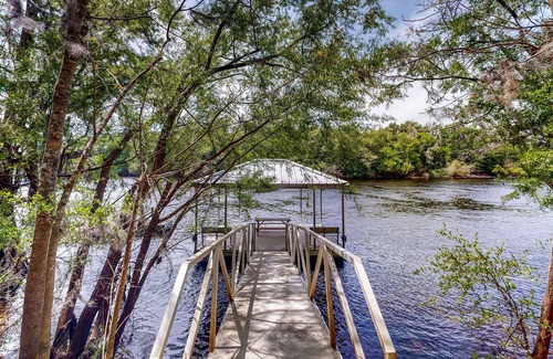 Bell House | Riverfront home with screened porch, shared dock