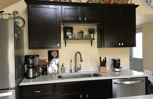 Mishicot House | Riverfront property guest lodging.
