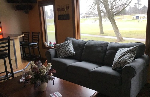 Mishicot House | Riverfront property guest lodging.