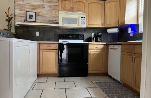 St. Nicholas House | Riverfront retreat just across from downtown, hospitals & stadium.