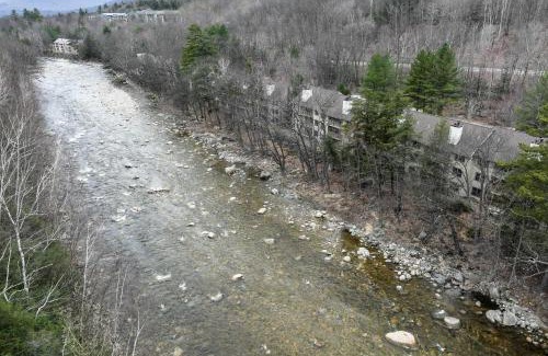 Lincoln Apartment | Riverfront Retreat with Deck 1 Mi to Loon Mtn!