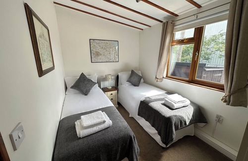 Brundall Cabin | Riverside 2 bedroom lodge. Fishing straight off the decking.