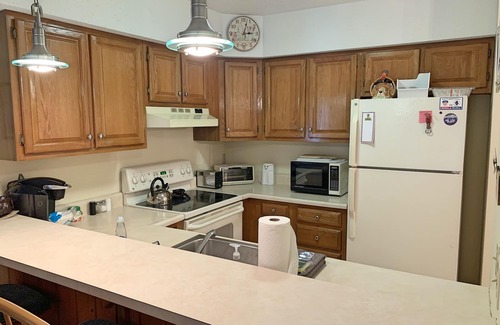 Lincoln Condo | Riverside, AC, deck, view, pool, swimming hole, tennis.