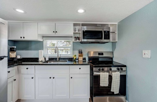 Braden River Apartment | Riverside Breeze! Tropical Retreat w Tiki Hut