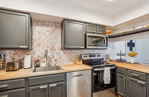 Stowe Area Condo | Riverside Getaway: 1br+ loft, fireplace, a/c, decks w/river views, free ski shuttle, Village area!