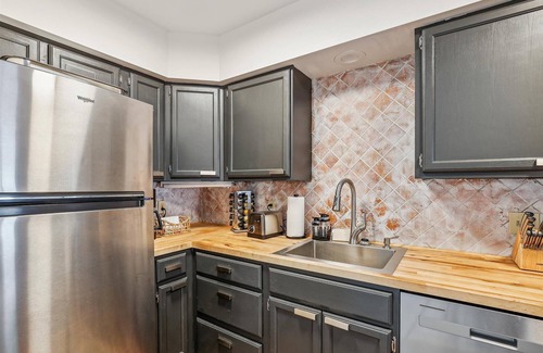 Stowe Area Condo | Riverside Getaway: 1br+ loft, fireplace, a/c, decks w/river views, free ski shuttle, Village area!