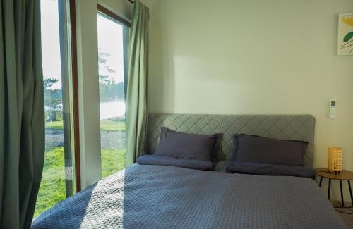 Jurmala House | RiverView Cozy Cabins in Jurmala with fishing opportunity