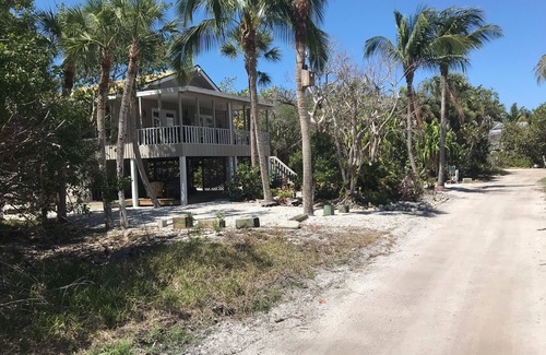 North Captiva Cottage | Romantic beach home with golf cart Remodeled Coastal charm