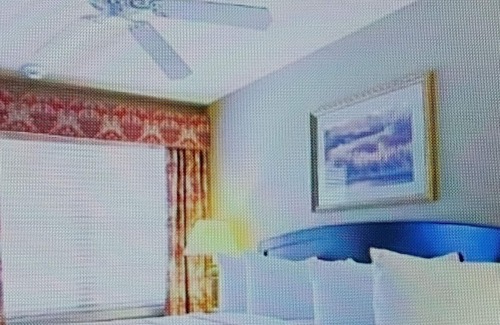 Lake Harmony Resort | Romantic getaway- hot tub and fireplace with a picturesque view of Lake Harmony!