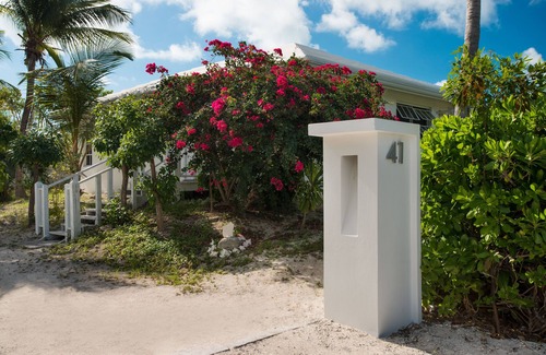 Leeward Settlement House | Romantic Getway Steps from the Beach