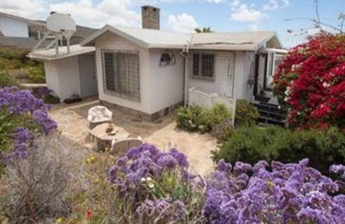 La Fonda Cottage | Romantic Ocean & Garden house - beach access and views