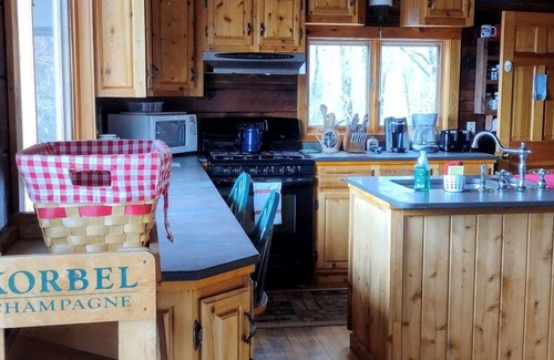 Beaver Cove House | Romantic sunset and lake view getaway w/wrap around deck, hot tub, & fireplace