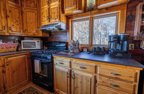 Beaver Cove House | Romantic sunset and lake view getaway w/wrap around deck, hot tub, & fireplace