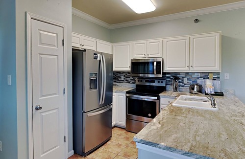 Orange Beach Condo | Romar Lakes #205e