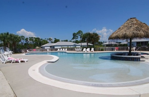 Fort Morgan Cottage | Rookery 3402 Cottage Minutes Away from Beach and the Gulf by RedAwning