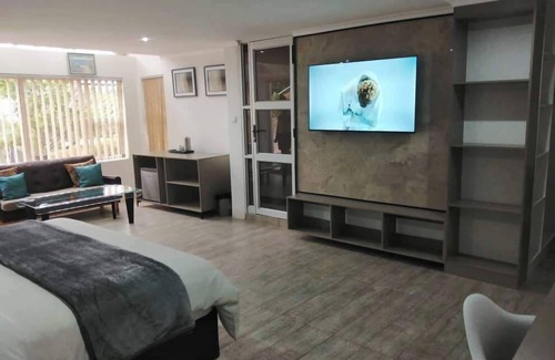 Harare Cabin | Room 1 of 8 Cozy Suites at The Hilltop Guesthouse