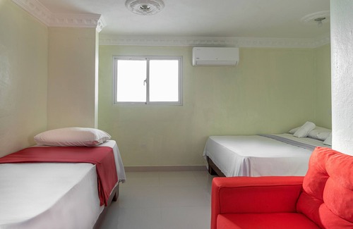 Tropical del Este House | Room-family Double Room in Corales del S