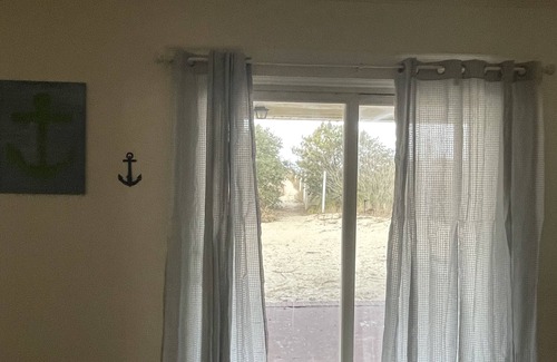 Cottage Line Apartment | Roomy Beachfront Apartment, Deck, Game Room! 2 Bedroom Apts by RedAwning