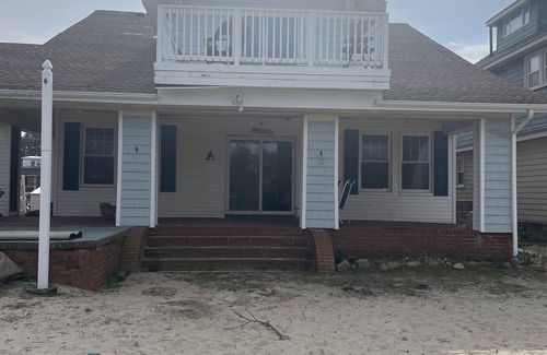 Cottage Line Apartment | Roomy Beachfront Apartment, Deck, Game Room! 2 Bedroom Apts by RedAwning