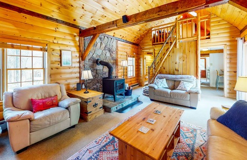 Plymouth House | Roomy farmhouse with private hot tub, firepit, pool table, sunroom, & woodstove