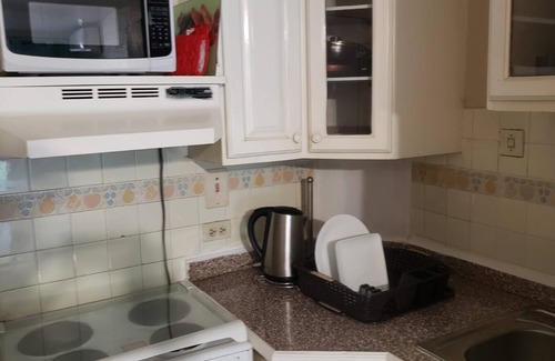 Ocho Rios Hotel | ROSI Ocean Sand Hotel Apt(@ Sandcastles) 1 bdm 3 beds. free beach,pool, parking