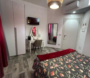 Zona XXXIII Acilia Sud Bed & Breakfast | Rosso Relativo
