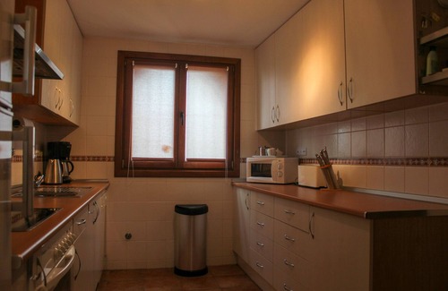 Costa Esuri Ski Chalet | ROU002 Townhouse with Private Garden and Direct Access to the Pool