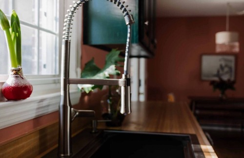 Riverland Terrace House | Ruby's Escapade: Art Hotel Speakeasy Vibes with Massive Outdoor Spaces