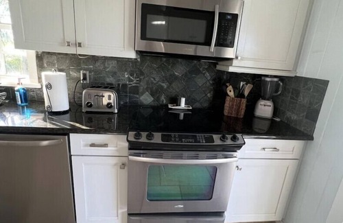 Captiva House | Rum Cove: Private Heated Pool, Golf Cart, Docks, Airstrip & Sleeps 10
