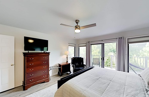 Stonecrest House | Rumbling Bald Resort getaway with 2 living areas, foosball & golf course views