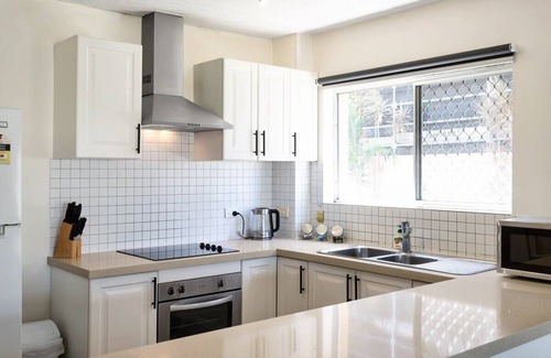 Runaway Bay Apartment | Runaway Bay Waterfront Delight