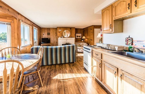 Lincoln City Apartment | RUSTIC 1 BEDROOM W/FULL KITCHEN, OCEAN VIEW DECK & REAL WOOD BURNING FIRE PLACE